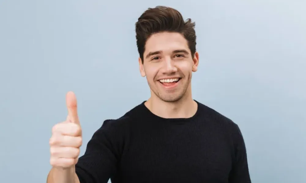 depositphotos_249526474-stock-photo-portrait-of-a-cheerful-handsome