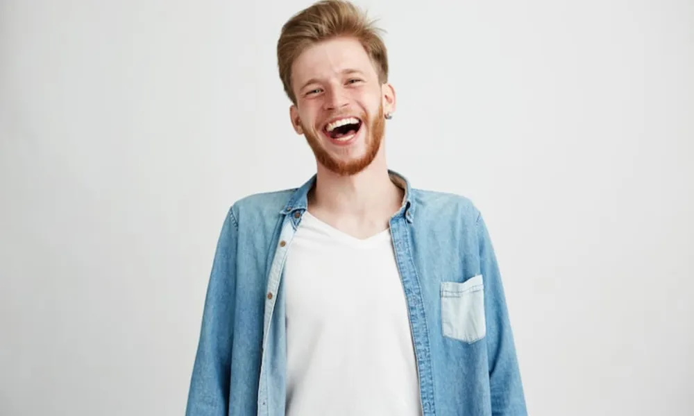 portrait-young-handsome-hipster-man-with-beard-smiling-laughing_176420-12171